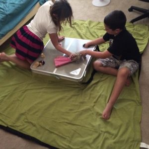 Kids playing on the Tablanket